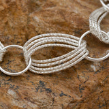 Woven Infinity Sterling Silver and Rhodium Bracelet
