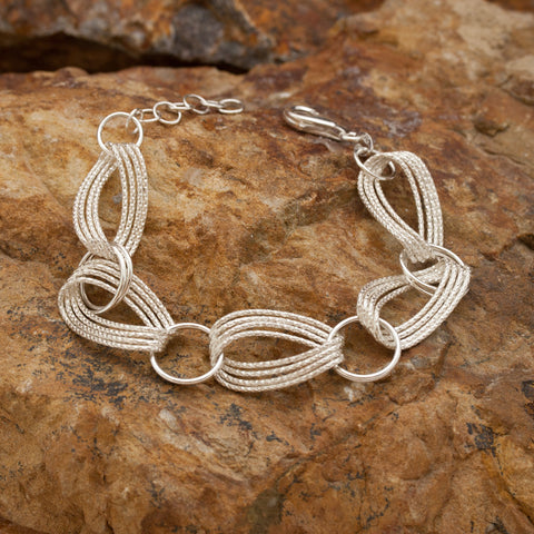 Woven Infinity Sterling Silver and Rhodium Bracelet